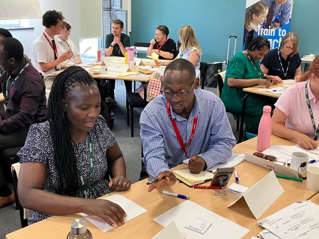 Trainees collaborating at a weekly training session